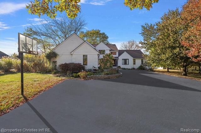 front view picture of 8793 Webster Hills Road, Dexter, MI. 48130