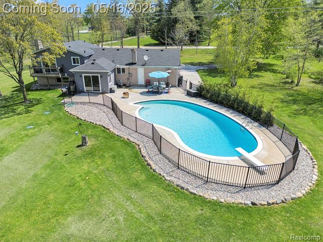 front view picture of 9703 Tower Road, South Lyon, MI. 48178