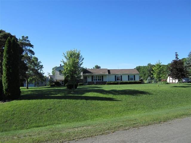 front view picture of 9822 Foxway Court, Dexter, MI. 48130