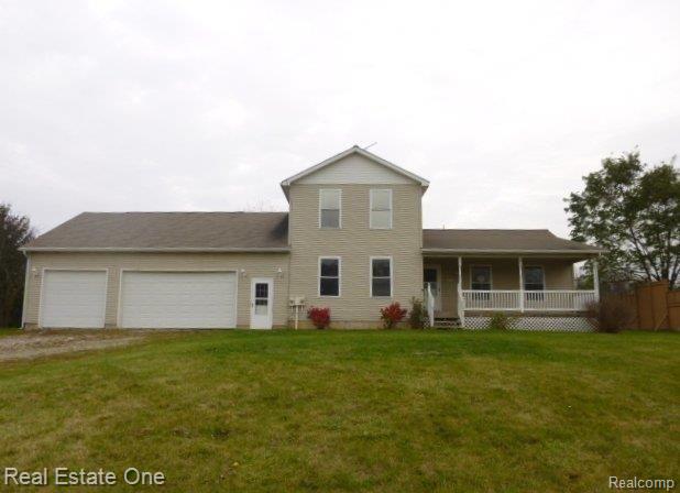 front view picture of 7880 N Nicholson Road, Fowlerville, MI. 48836