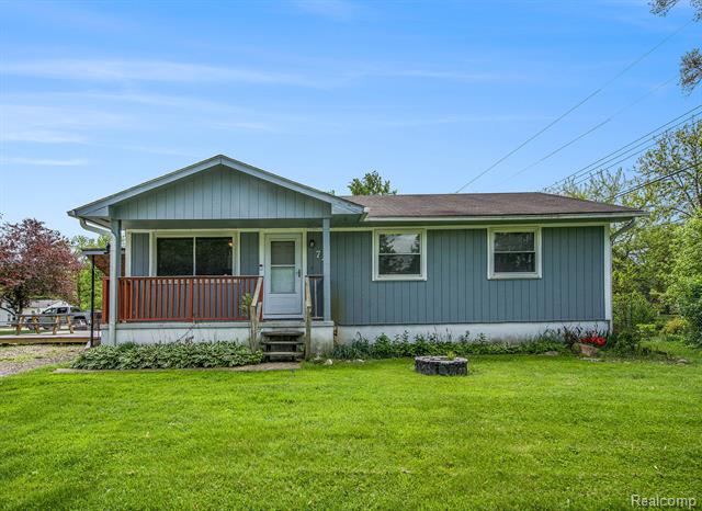 front view picture of 74 Ash Road, Whitmore Lake, MI. 48189