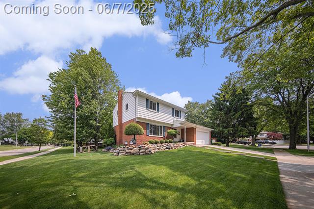 front view picture of 489 Old Creek Court, Saline, MI. 48176