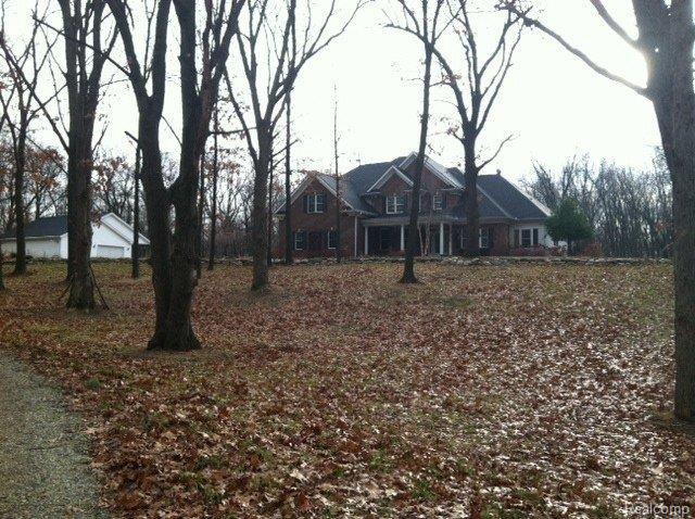 front view picture of 500 Hawk High Hill Road, Metamora, MI. 48455