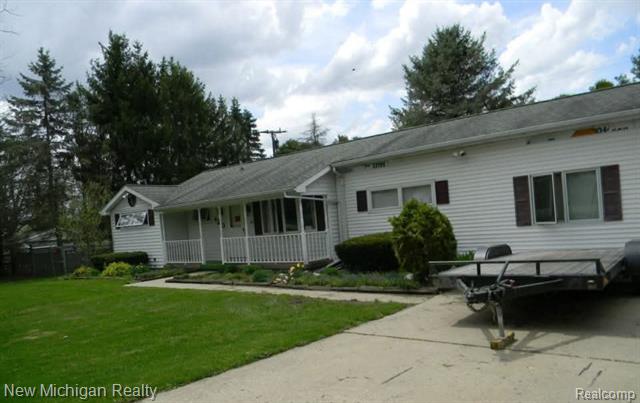 front view picture of 420 S Maple Street, Webberville, MI. 48892