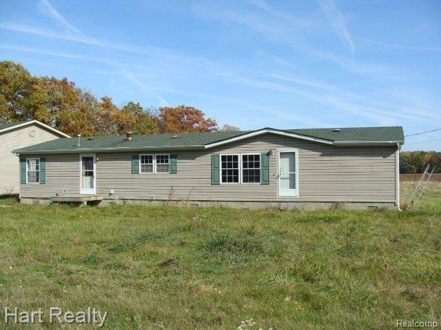 front view picture of 1736 Wheeling Road, Imlay City, MI. 48444