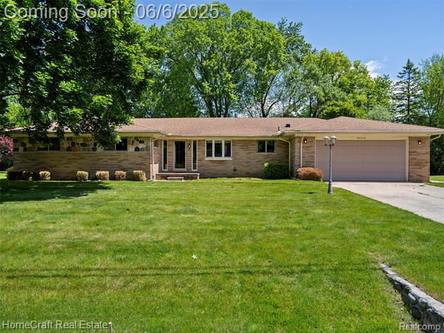 front view picture of 28210 Ridgebrook Rd, Farmington, MI. 48334