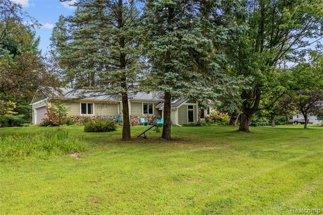 front view picture of 6218 Curtis Road, Plymouth, MI. 48170