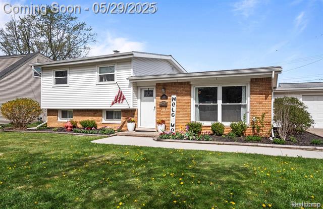 front view picture of 1128 Braeview Drive, Howell, MI. 48843