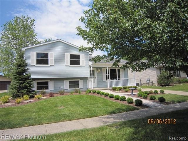 front view picture of 830 Tanager Trail, Howell, MI. 48843