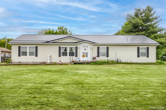 front view picture of 355 Carpenter Road, Fostoria, MI. 48435