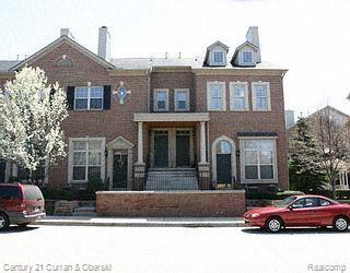 front view picture of 22157 W Village Drive, Dearborn, MI. 48124