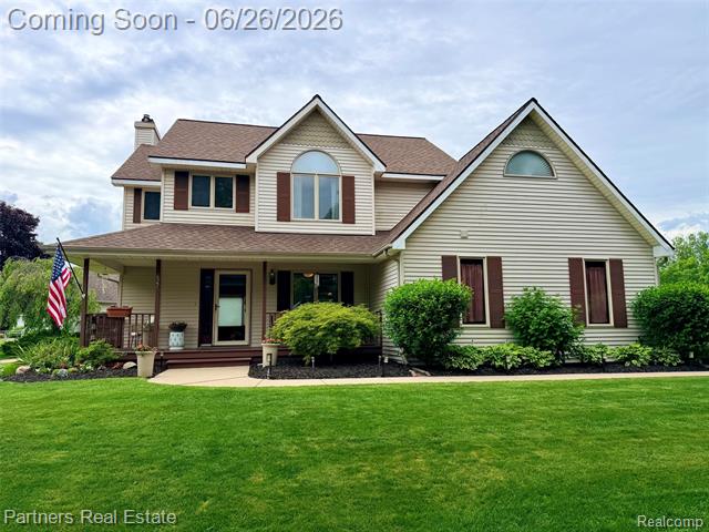 front view picture of 627 W Caledoniaw  Street, Howell, MI. 48843