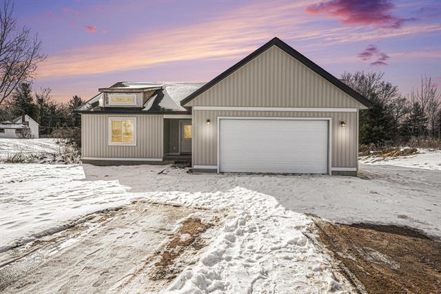 front view picture of 5057 N Point Drive, Pierson, MI. 49339