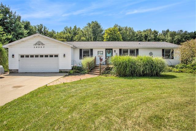 front view picture of 10337 4 Mile Road, East Leroy, MI. 49051