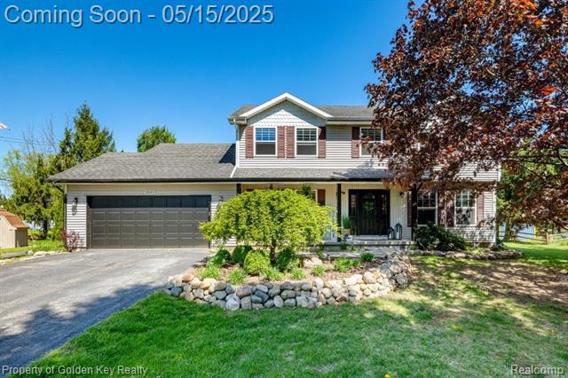 front view picture of 9849 Marshall Road, South Lyon, MI. 48178