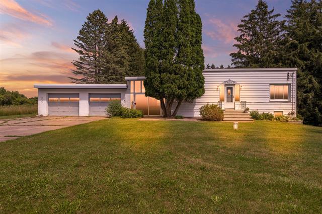 front view picture of 6747 Meridian Road, Laingsburg, MI. 48848