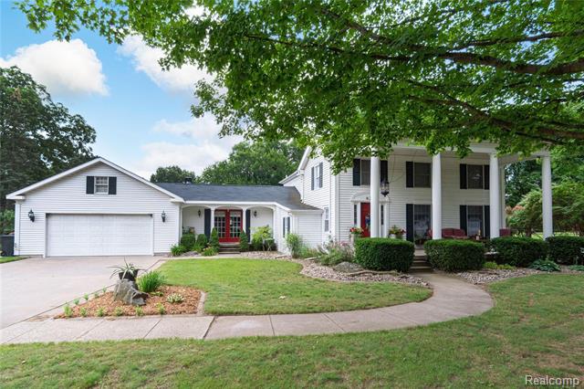 front view picture of 624 Deland Road, Flushing, MI. 48433