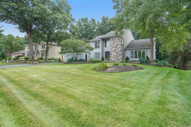 front view picture of 7700 Kirkwallse  Drive, Ada, MI. 49301