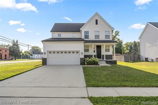 front view picture of 215 Clinton Street, Romeo, MI. 48065