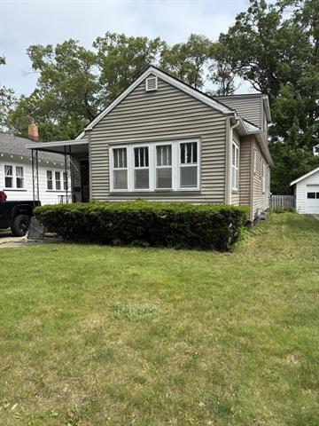 front view picture of 1068 Ada Avenue, Muskegon, MI. 49442