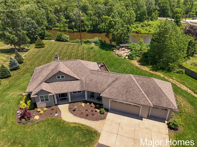 front view picture of 8298 Thornapple Riverse  Drive, Caledonia, MI. 49316