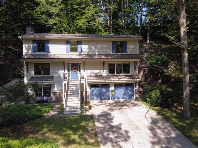 front view picture of 401 Stickney Ridge Road, Grand Haven, MI. 49417