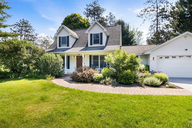 front view picture of 9075 Windsong Lane, Cadillac, MI. 49601