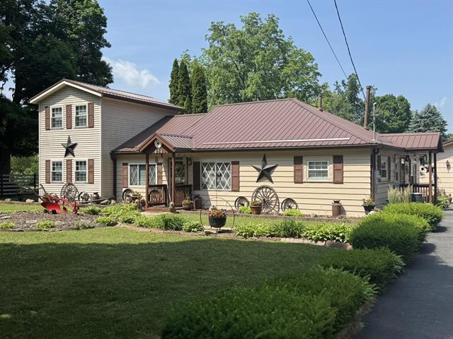front view picture of 414 S Chicago Street, Litchfield, MI. 49252