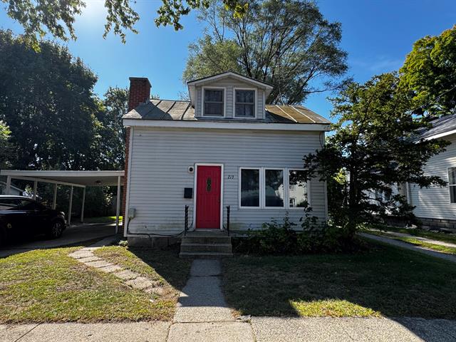 front view picture of 213 W Montcalm Street, Greenville, MI. 48838