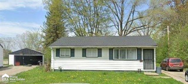 front view picture of 5509 Farmhill Rd, Flint, MI. 48505
