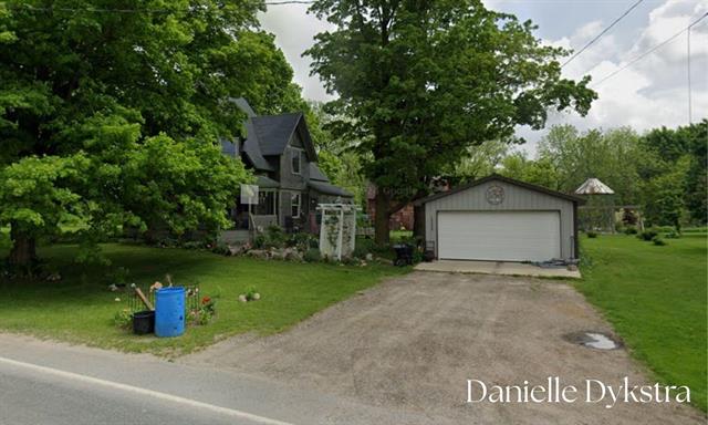 front view picture of 6951 S Vickeryville Road, Sheridan, MI. 48884