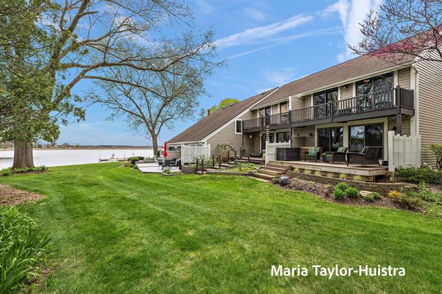 front view picture of 584 Wind Drift Lane, Spring Lake, MI. 49456