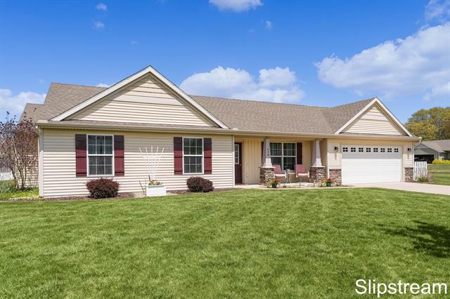 front view picture of 879 Harmonyne  Drive, Sparta, MI. 49345
