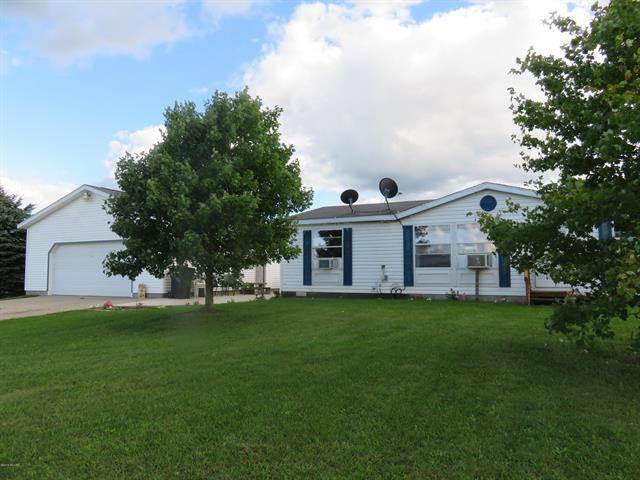 front view picture of 3978 W 112Th Street, Grant, MI. 49327