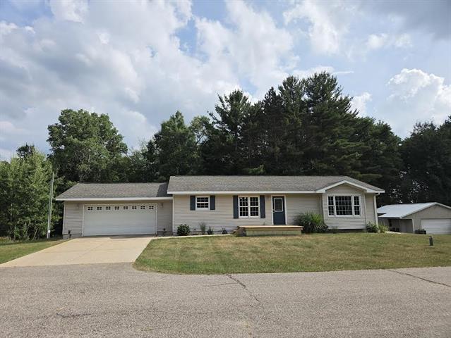 front view picture of 21771 8 Mile Road, Stanwood, MI. 49346
