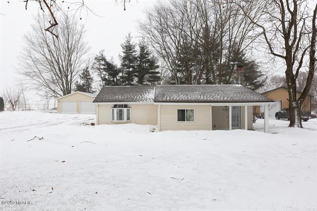 front view picture of 996 East Street, Coopersville, MI. 49404