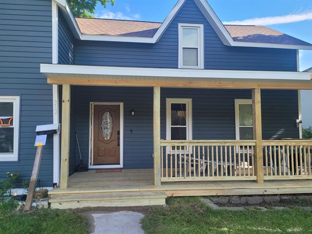 front view picture of 312 W Upton Avenue, Reed City, MI. 49677