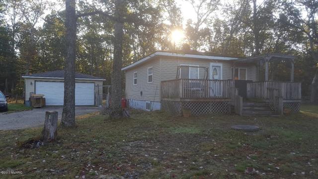 front view picture of 10640 S M-37, Baldwin, MI. 49304