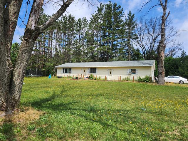 front view picture of 8335 Connecticut, Baldwin, MI. 49304