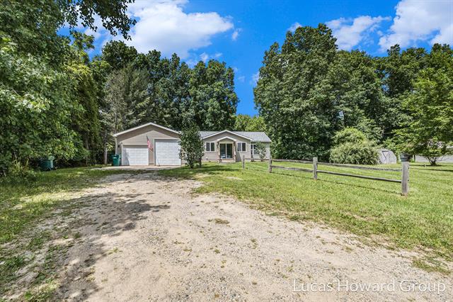front view picture of 3155 Cowboy Cove Lane, Ionia, MI. 48846