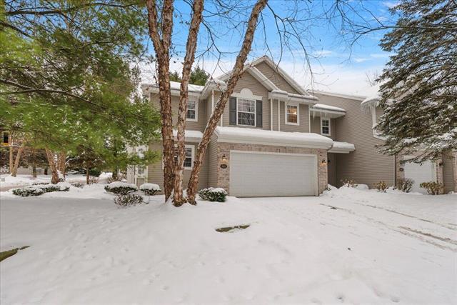 front view picture of 661 Abbey Millse  Drive, Ada, MI. 49301