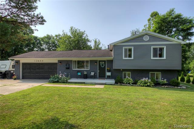 front view picture of 12644 Silver Lake Road, Brighton, MI. 48116