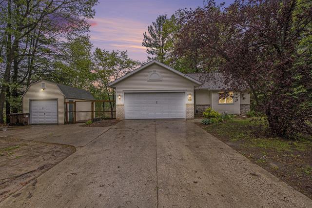 front view picture of 11199 W Harlow Road, Greenville, MI. 48838