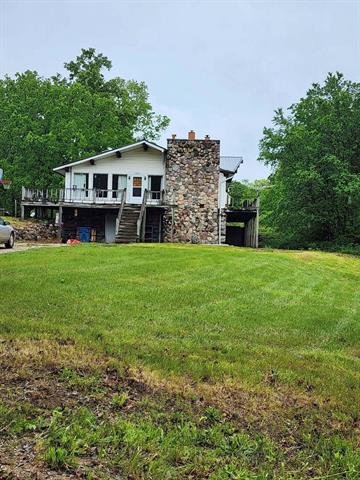 front view picture of 20564 1 Mile Road, Morley, MI. 49336