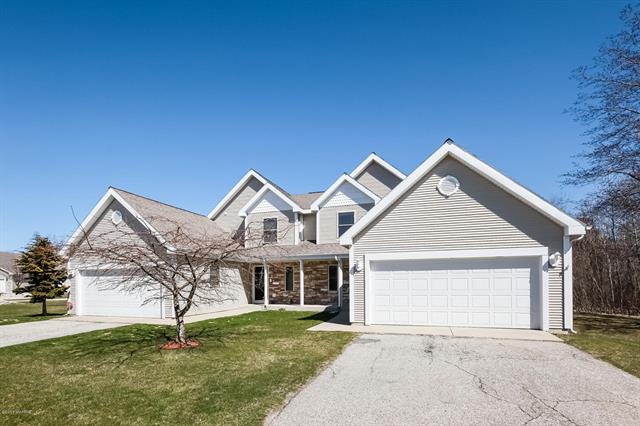 front view picture of 966 Stonewood Drive, Spring Lake, MI. 49456
