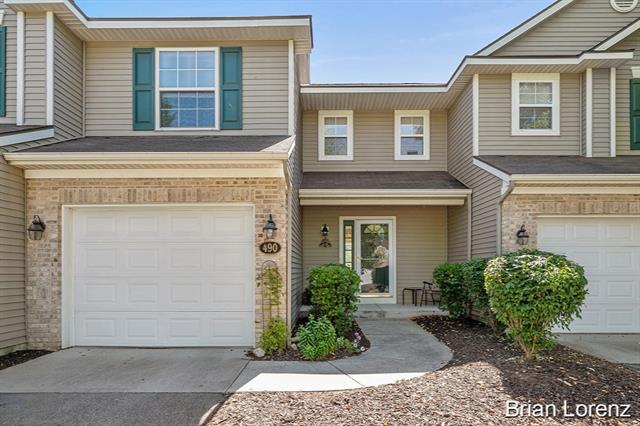 front view picture of 490 Abbey Millse  Drive, Ada, MI. 49301
