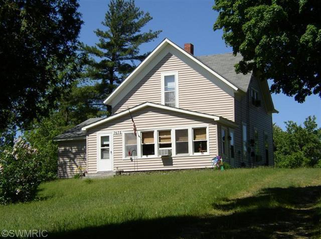 front view picture of 7675 Potter Road, Bear Lake, MI. 49614