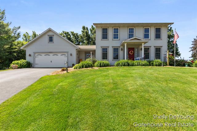 front view picture of 6824 Hermoso Court, Rockford, MI. 49341