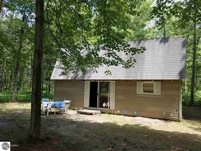 front view picture of 11744 N Benson, Manistee, MI. 49660