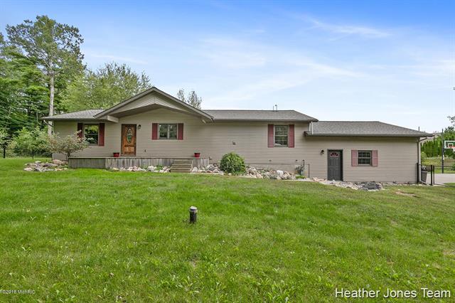 front view picture of 13077 19 Milene  Road, Gowen, MI. 49326